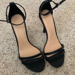 black strapped heels